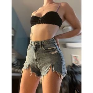 Distressed cutoff denim shorts